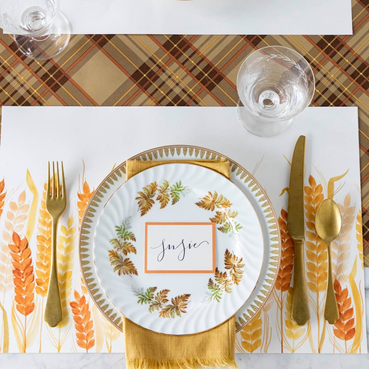 The Golden Wheat Placemat under a fall themed place setting, from above.