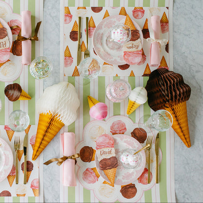 An ice cream themed table setting with the Die-cut Ice Cream Placemat and Ice Cream Placemat under place settings.