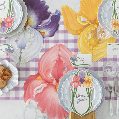 The Die-cut Iris Placemats under a bright springtime table setting, from above.