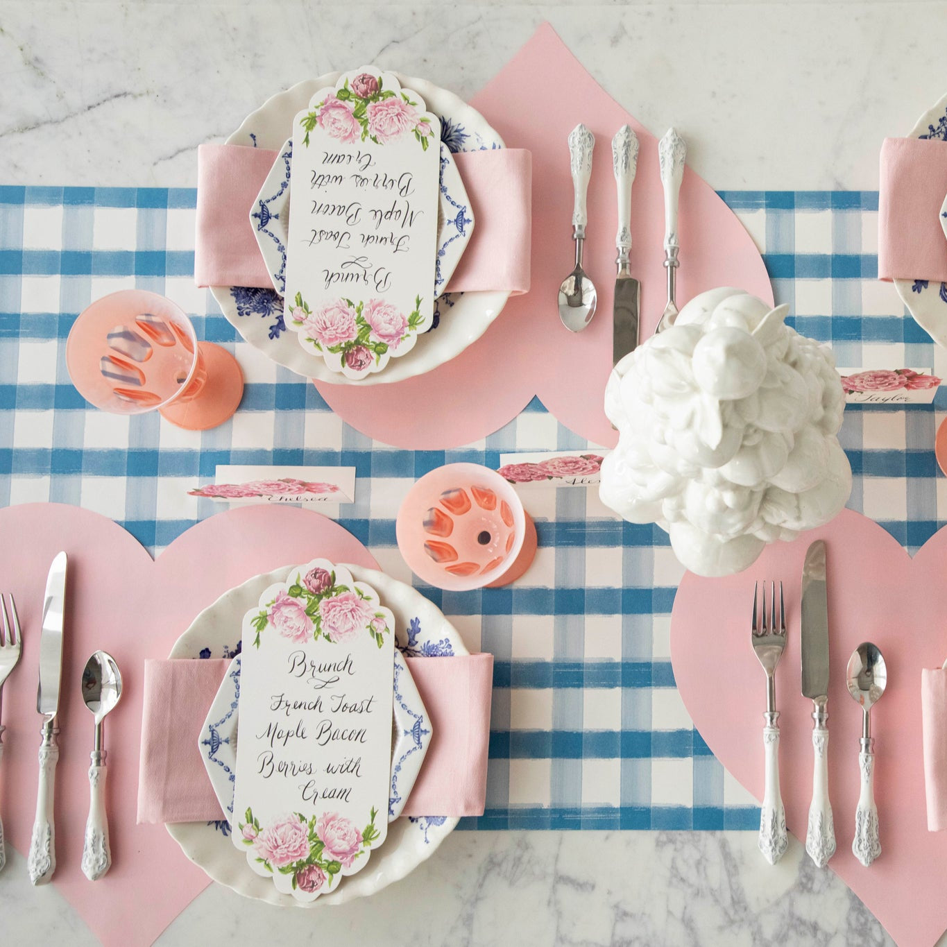 Blue Painted Check Runner under a romantic table setting for three.