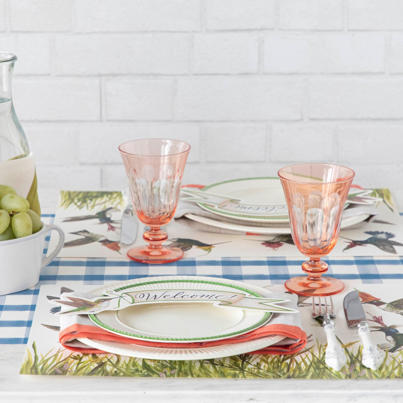 Blue Painted Check Runner under a spring themed table setting for two.