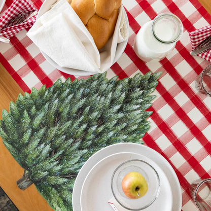 The Die-cut Evergreen Placemat under a rustic place setting, from above.