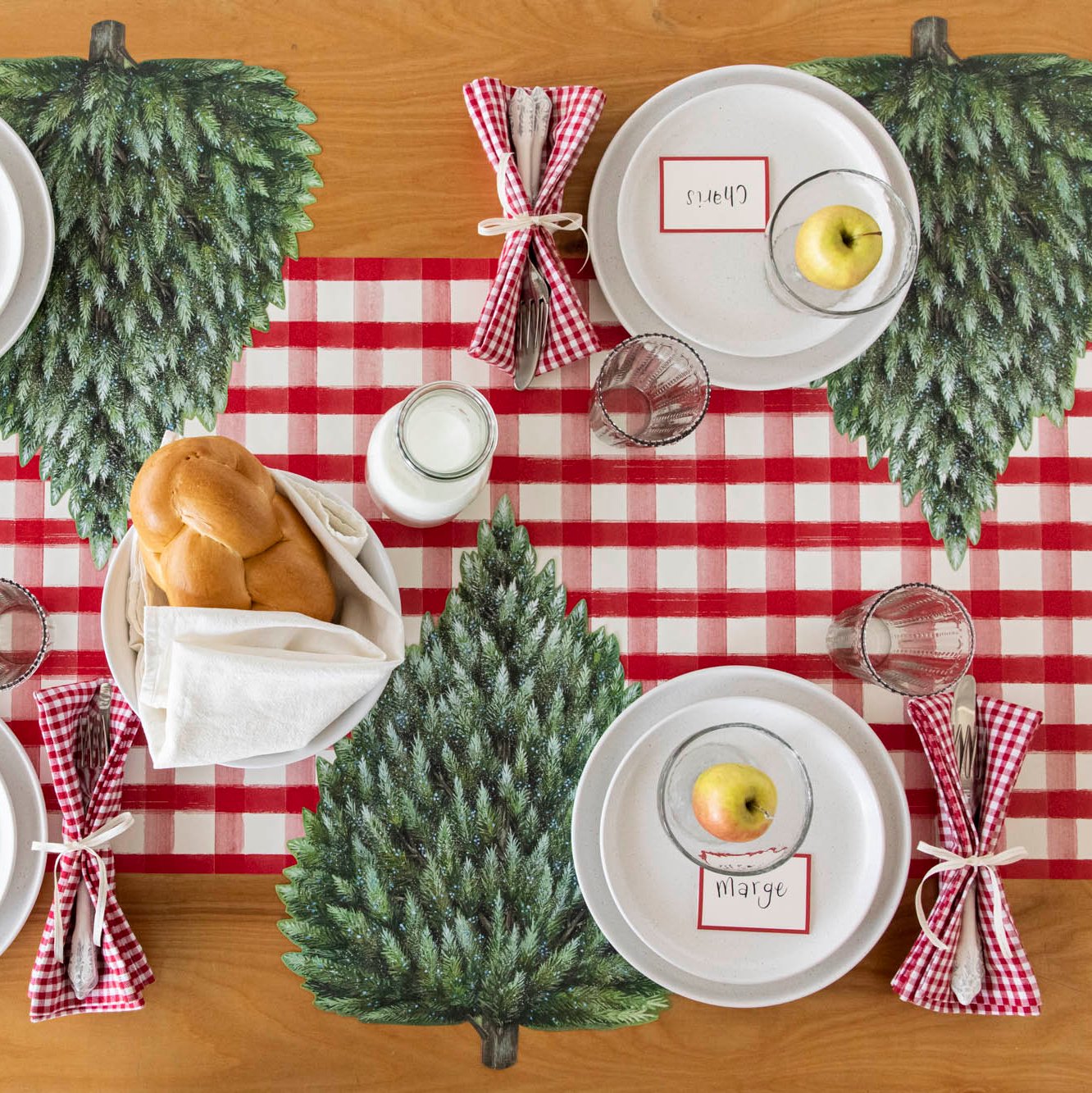 The Die-cut Evergreen Placemat under a rustic place setting, from above.