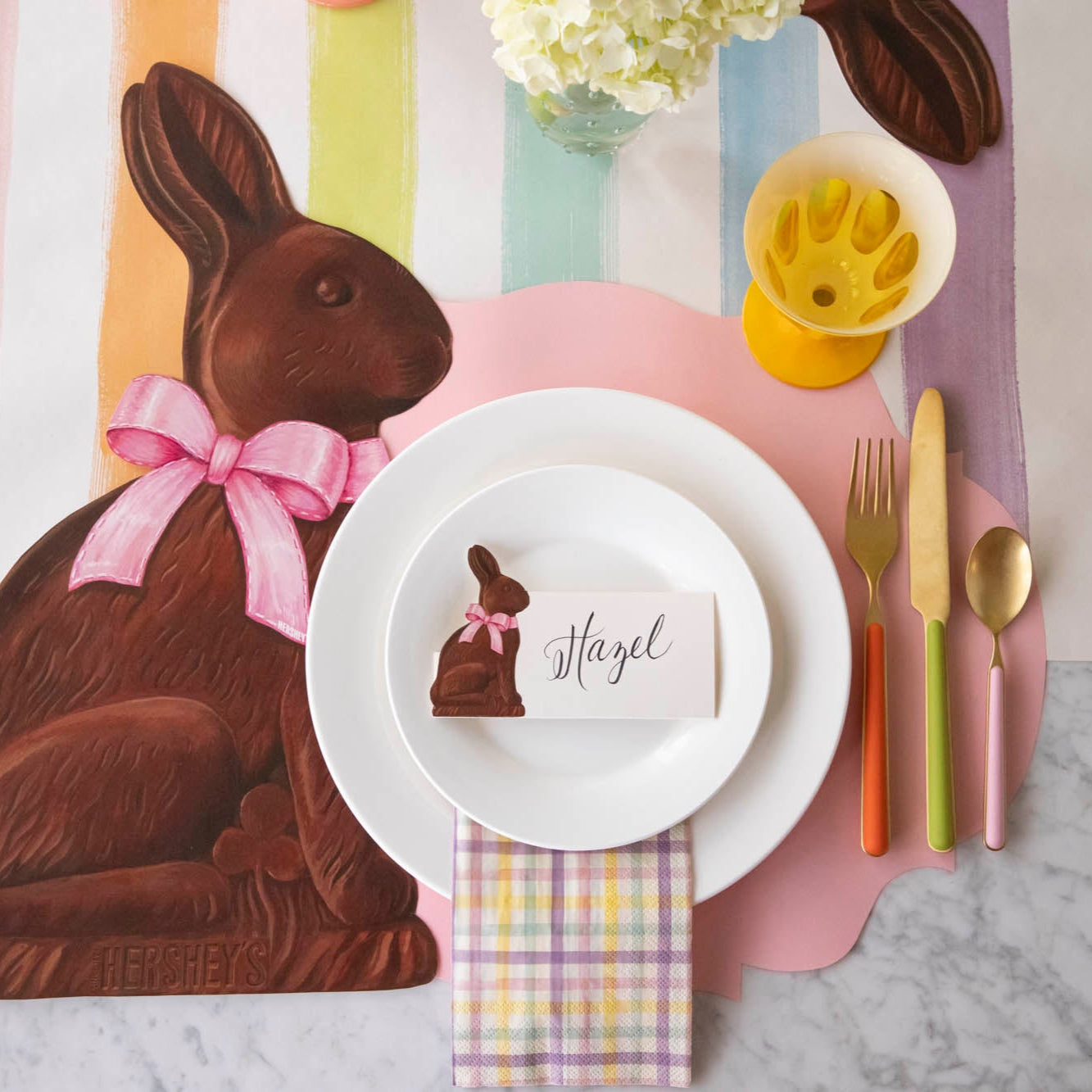 Die-cut Pink French Frame Placemat styled on an Easter themed table setting.