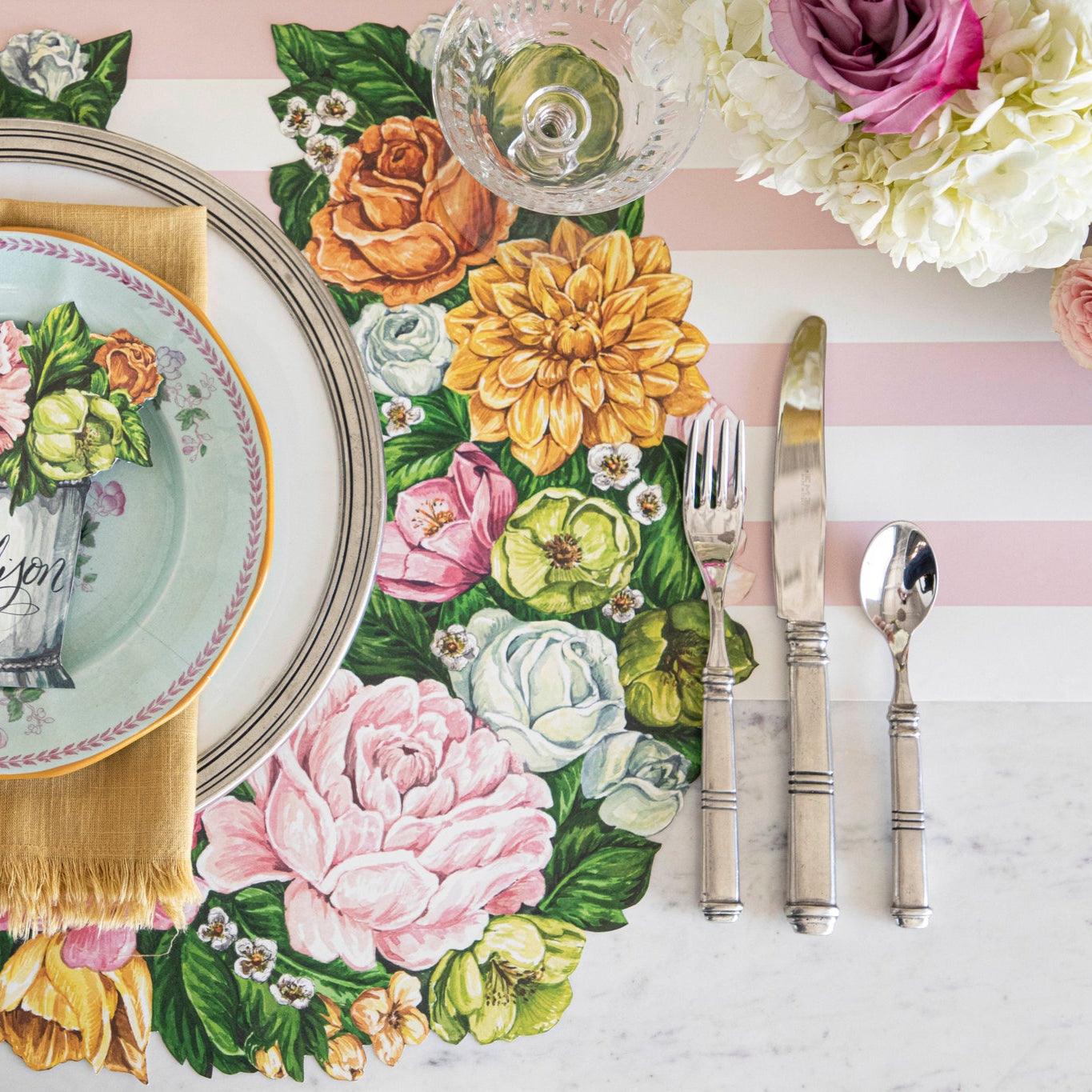 Pink Classic Stripe Runner under the Garden Derby Placemat on an elegant table setting.