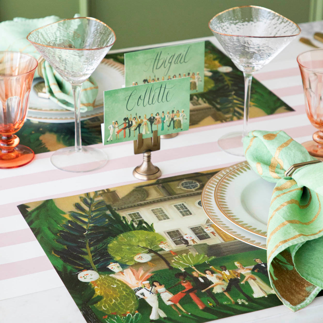 Pink Classic Stripe Runner under the High Kick Placemat and elegant place setting on top.