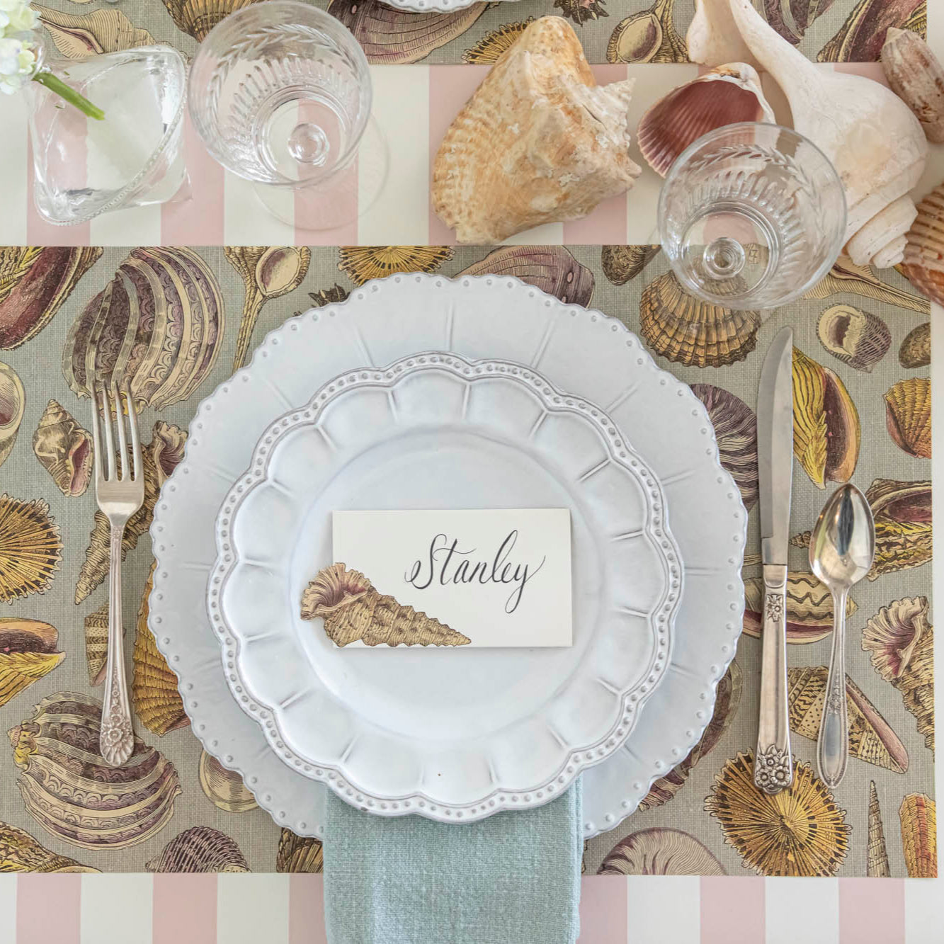 Pink Classic Stripe Runner under a shell themed table setting.