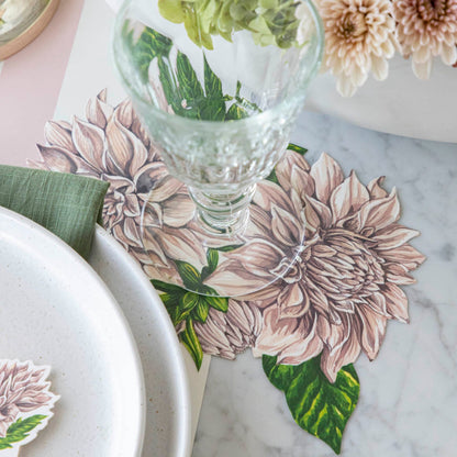 Dahlia Table Accent under a glass, on a place setting for one.