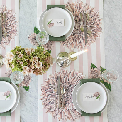 Dahlia Table Accent under a glass on a place setting.