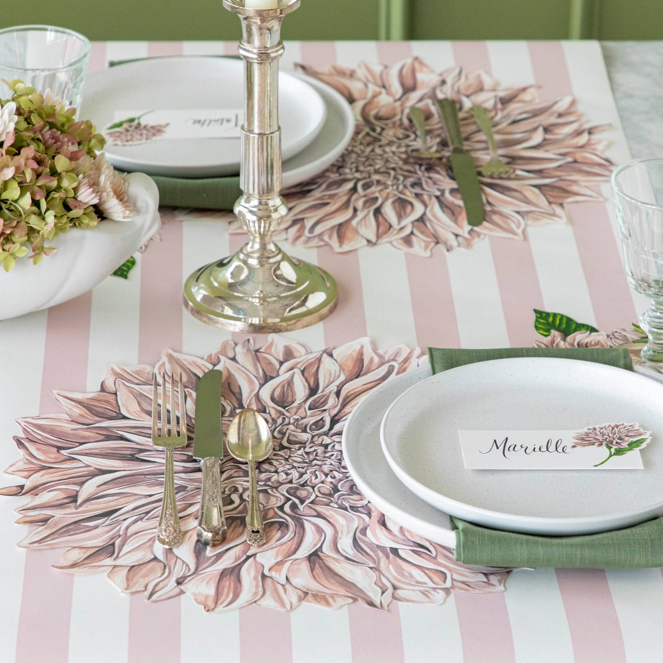 Die-cut Dahlia Placemat under a place setting for one and Pink Classic Stripe Runner underneath.