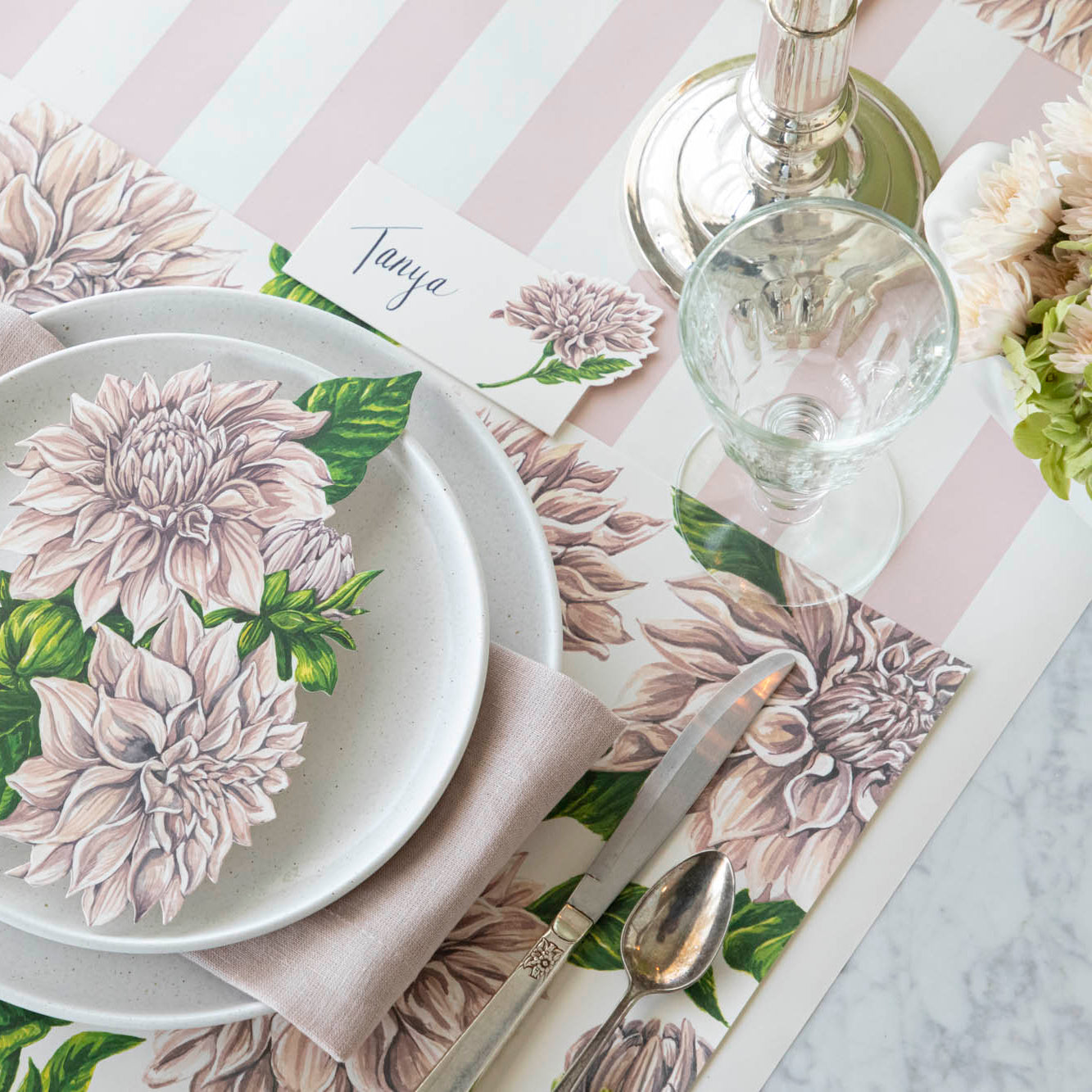 Delightful Dahlias Placemat under a place setting for one.