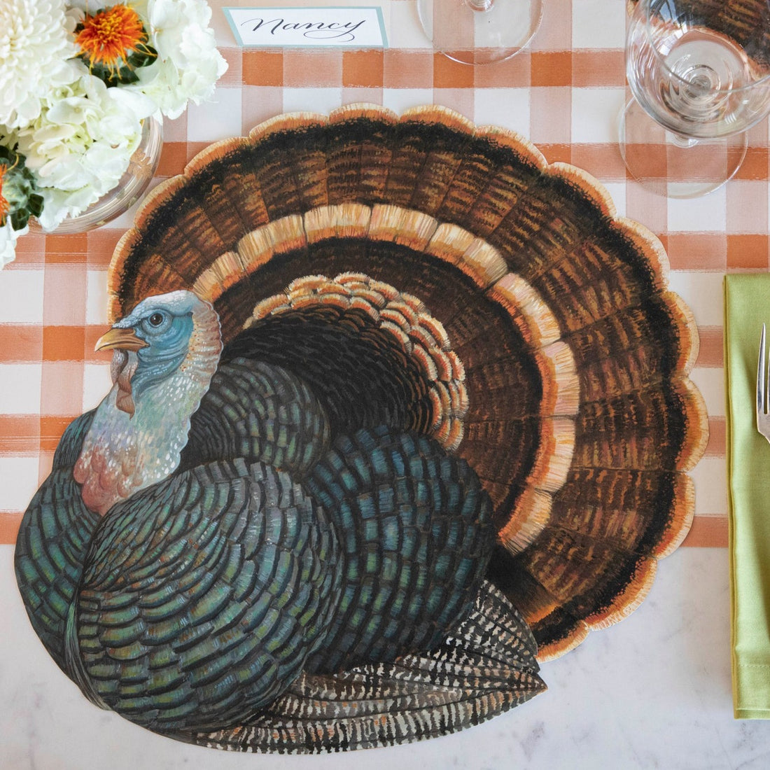 The Die-cut Heritage Turkey Placemat on an elegant Thanksgiving table setting.