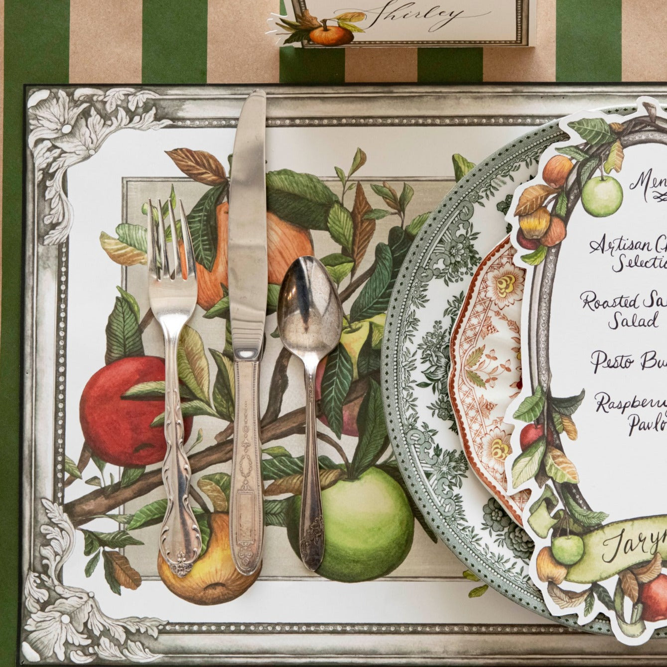 Close-up of the Kraft Green Classic Stripe Runner under an elegant place setting, from above.