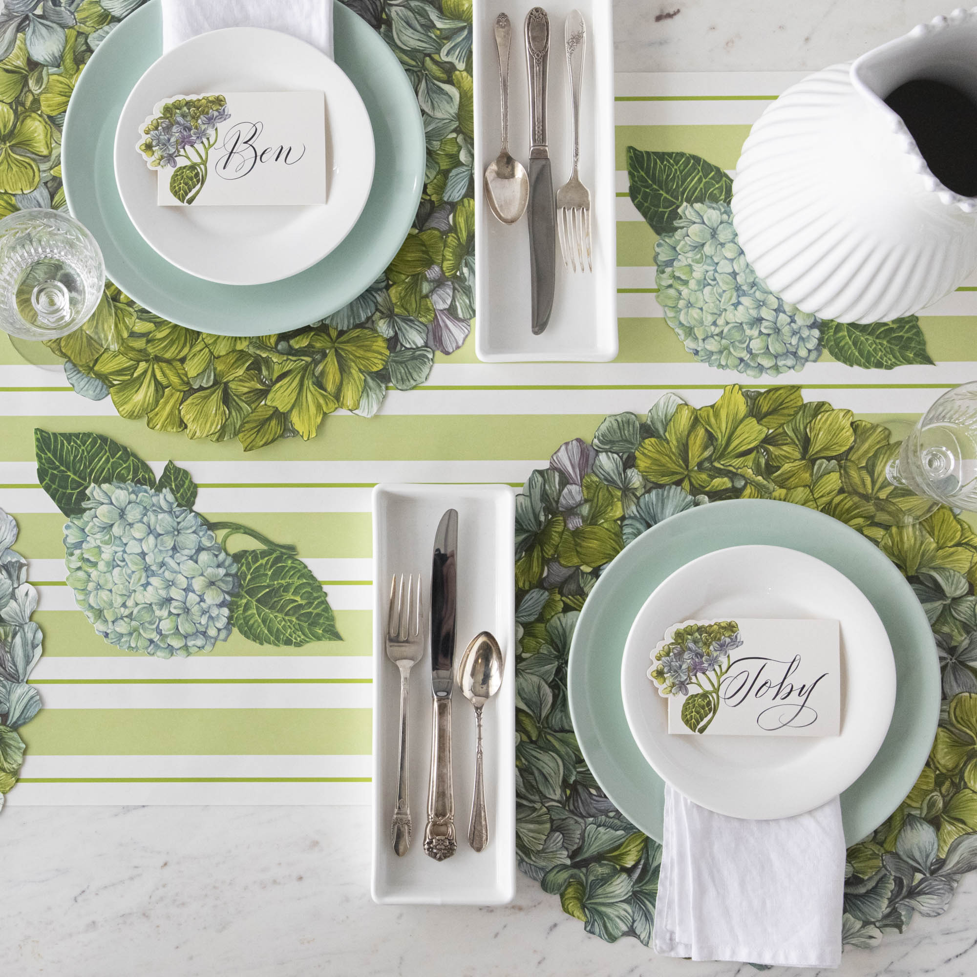 Green Awning Stripe Runner under a Hydrangea themed table setting for two.