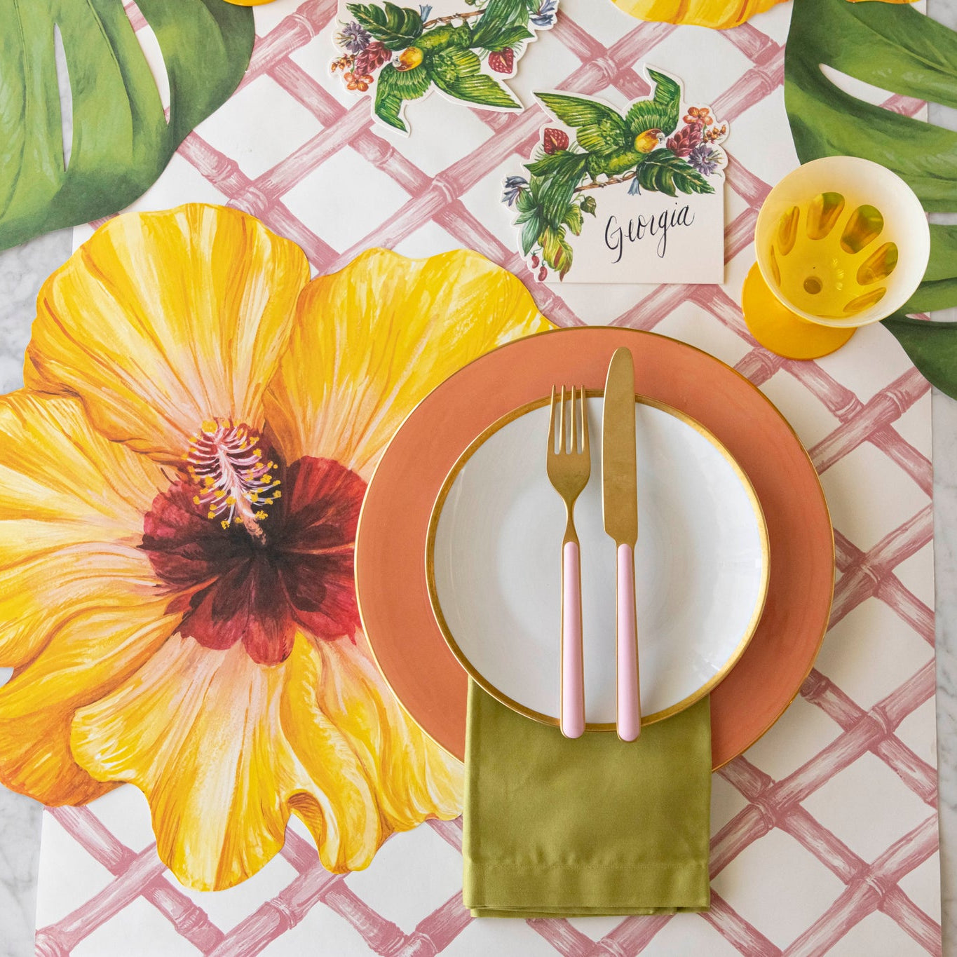 Pink Lattice Runner under a tropical themed table setting.