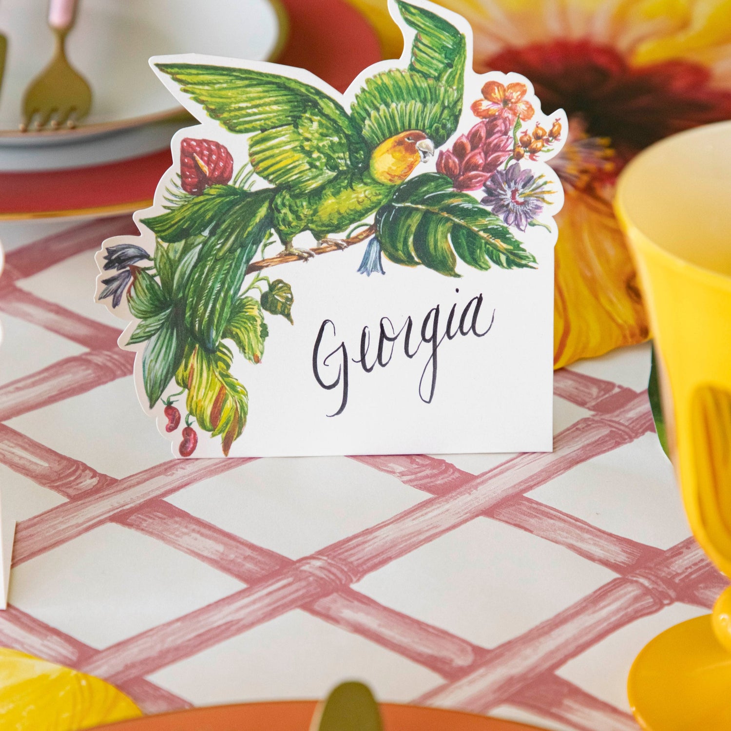 Pink Lattice Runner under the Parrot Place Card, on a tropical table setting.