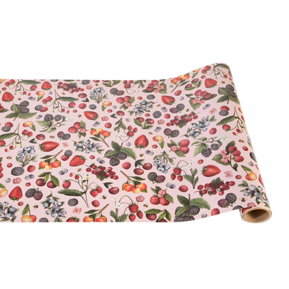 The Wild Berry Runner featuring a pattern of wild berries on a pink background.