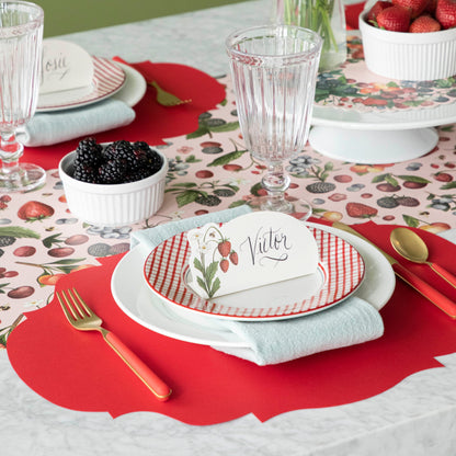 Die-cut Red French Frame Placemat under a spring place setting.