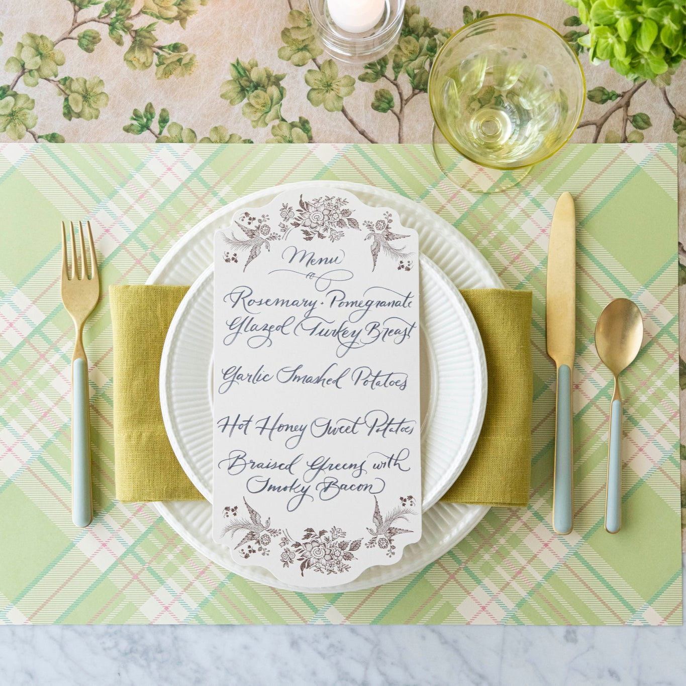 Bright Green Plaid Placemat on the Green Cherry Blossom runner, with a place setting for one on top.