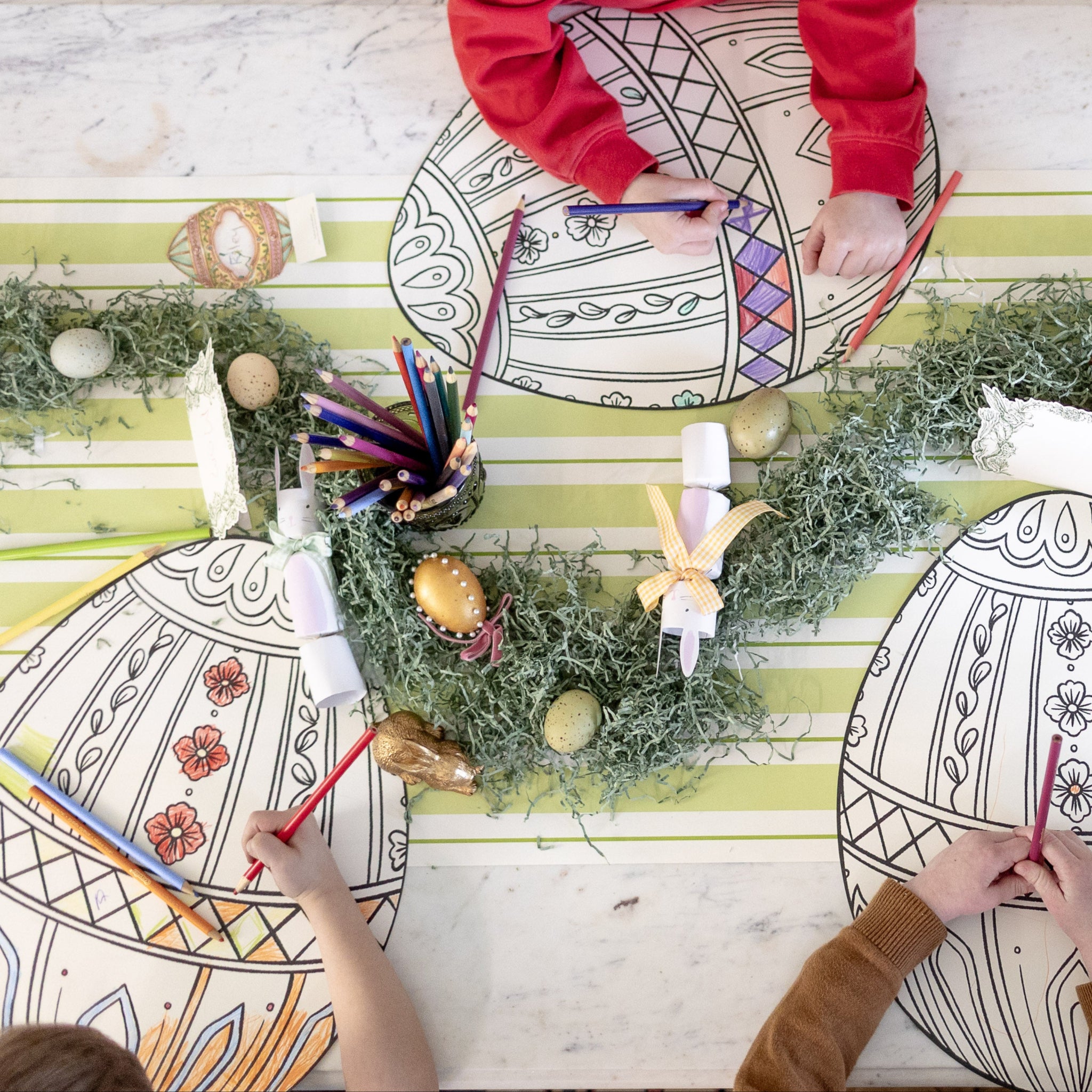 Kids coloring the Die-cut Easter Egg Placemat.