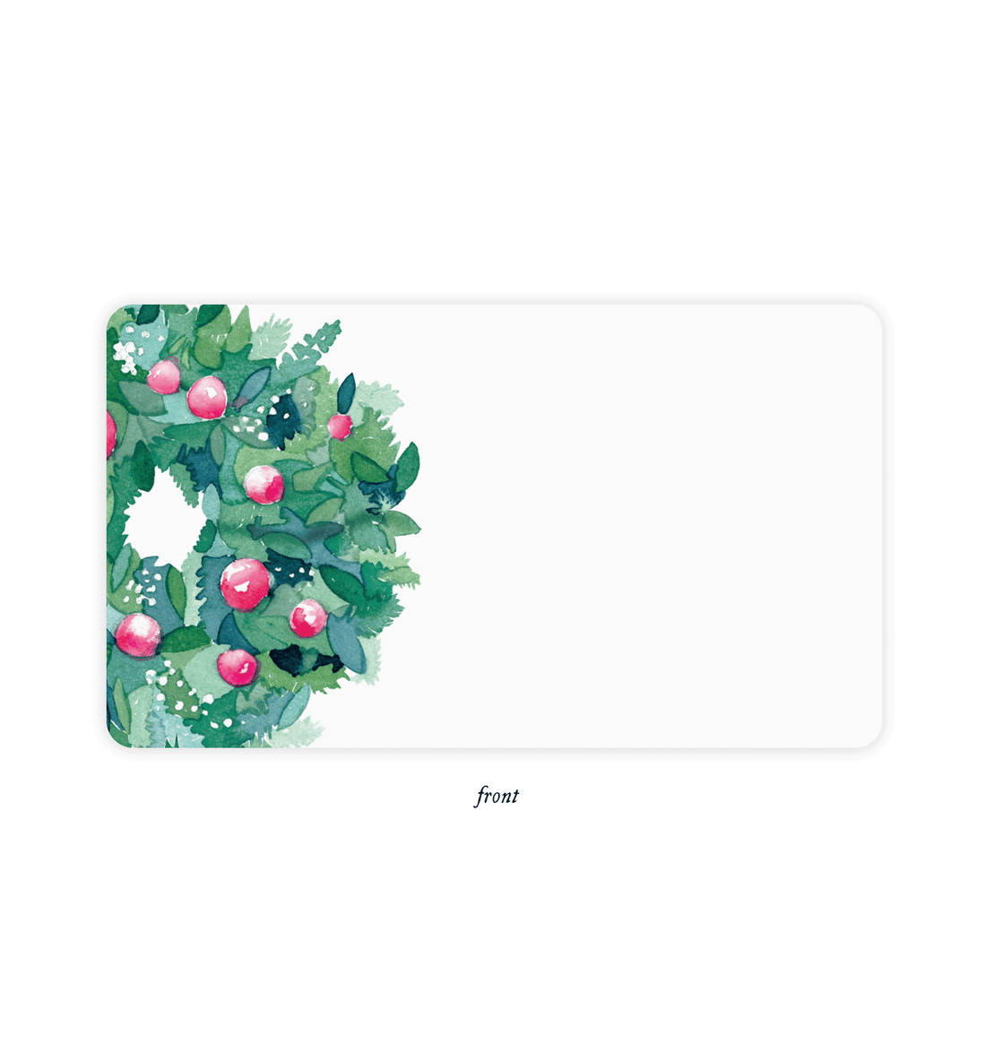 front of little notes with illustration of a green wreath with red ornaments in it