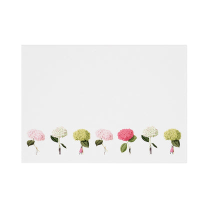 A white note card featuring a row of illustrated tiny people along the bottom of the card, each holding a giant hydrangea bloom in green, white or pink. 