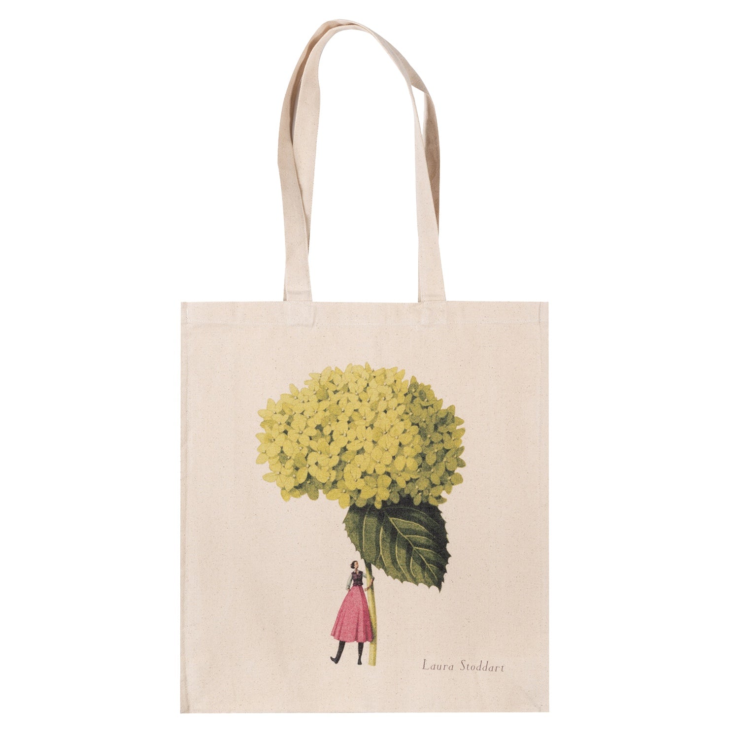 The Annabelle Heavyweight Canvas Tote Bag is light tan featuring a stylized illustration of a woman holding a gigantic green hydrangea bloom by the stem.