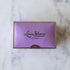 2-Piece Amethyst Louis Sherry Chocolate Box on a marble table.