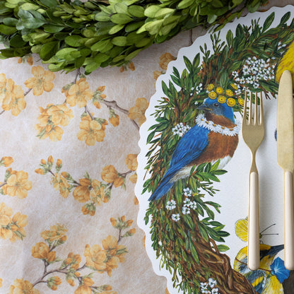 Marigold Cherry Blossom Runner under a boxwood wreath and Die-cut Songbird Wreath Placemat.