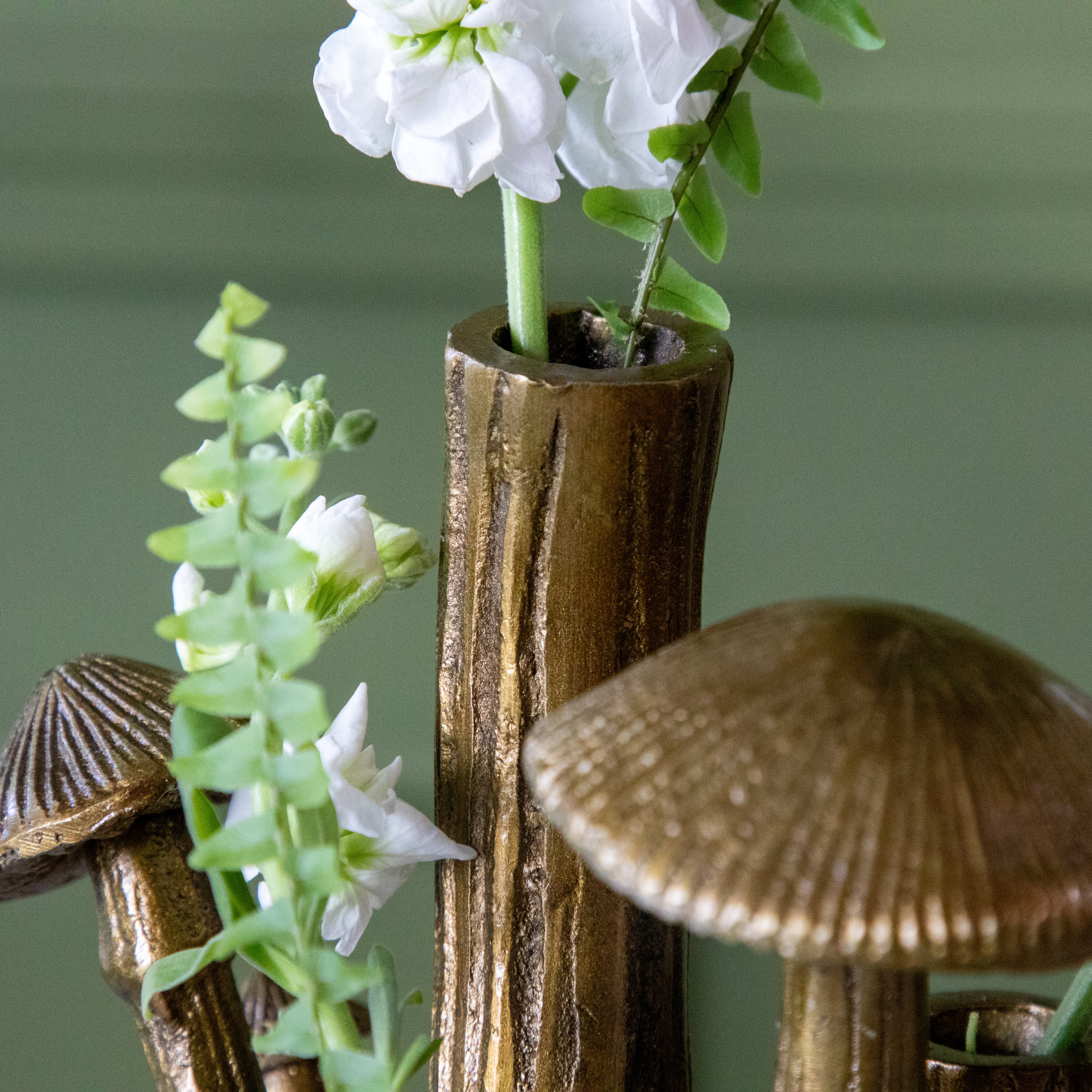  A close up of the Clustered Mushroom Budvase showing the lined details of the stem.