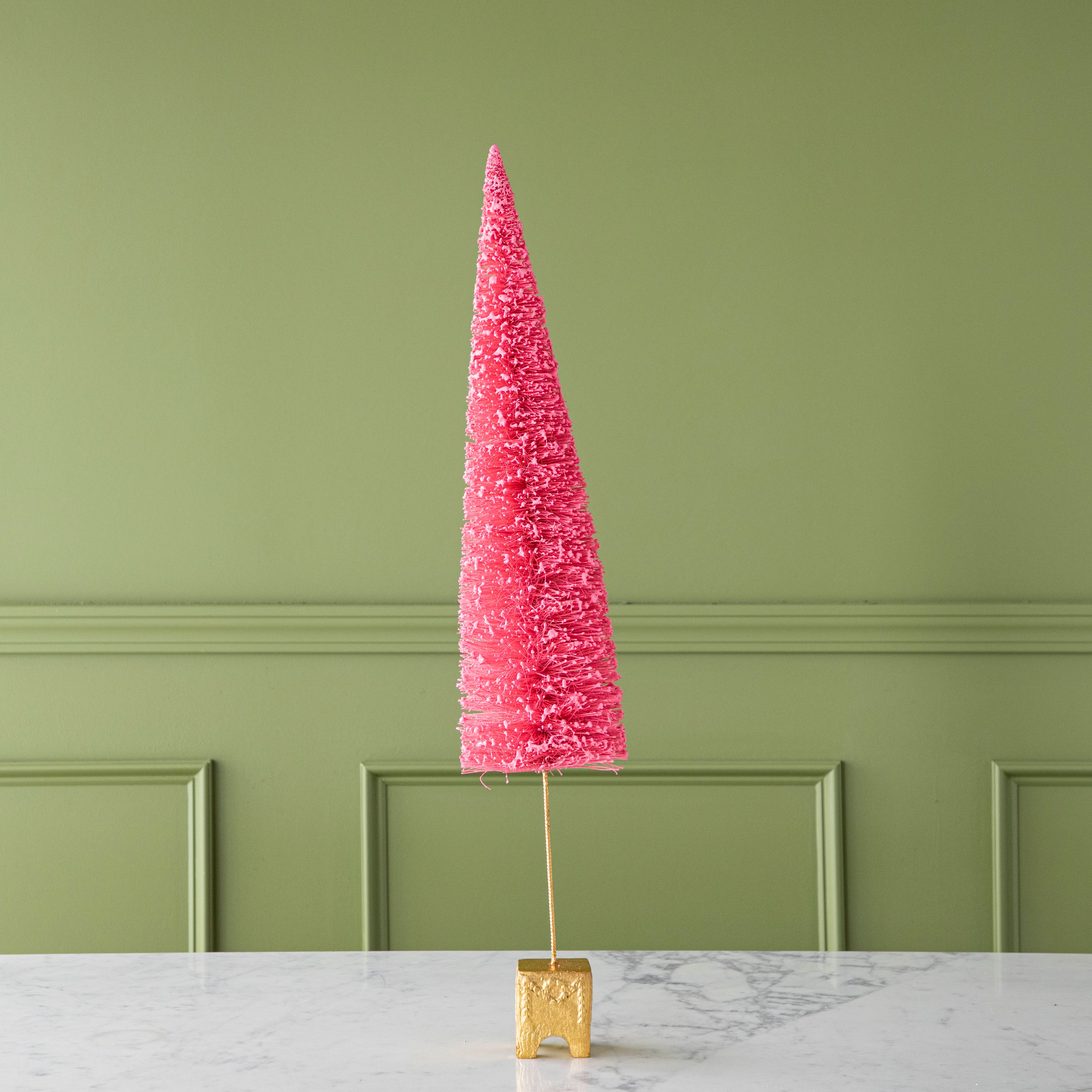 A 29&quot; Coral French Forest Sisal Tree with a gold base, on a marble table.