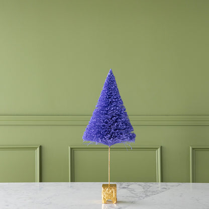 A 22&quot; Ultra Violet French Forest Sisal Tree with a gold base, on a marble table.