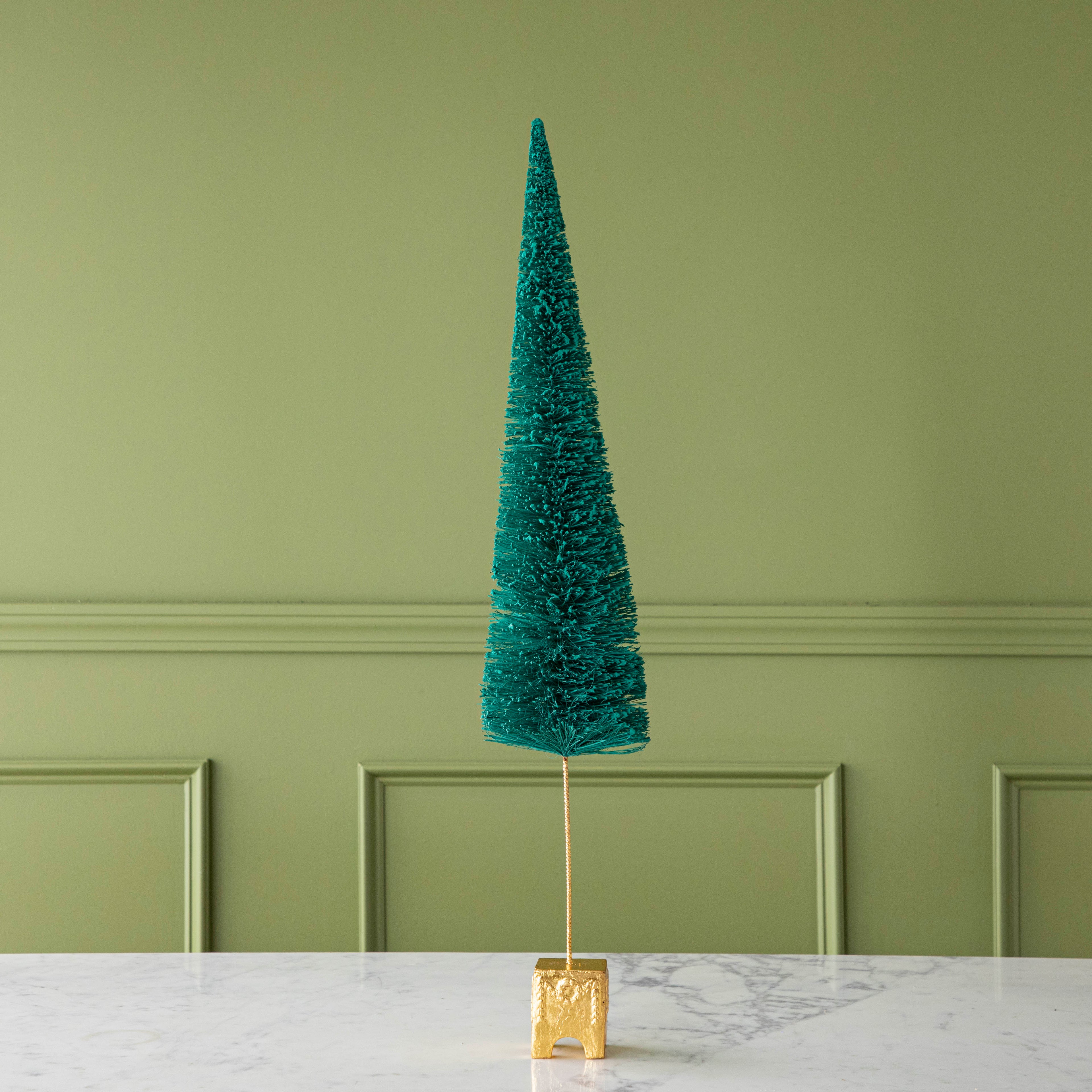 A 29&quot; Dark Green Forest Sisal Tree with a gold base, on a marble table.