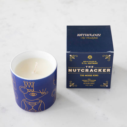 Nutcracker candle next to its box