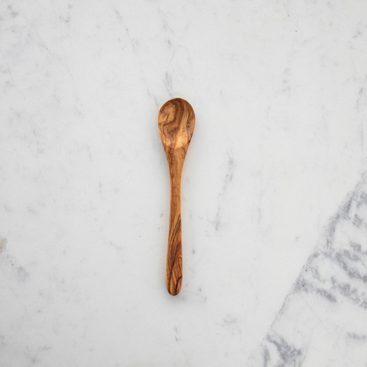 A set of nonporous Natural Olivewood Olivewood Spoons with lemons and salt.