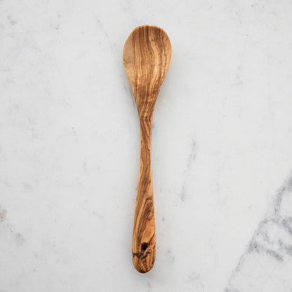 A set of nonporous Natural Olivewood Olivewood Spoons with lemons and salt.