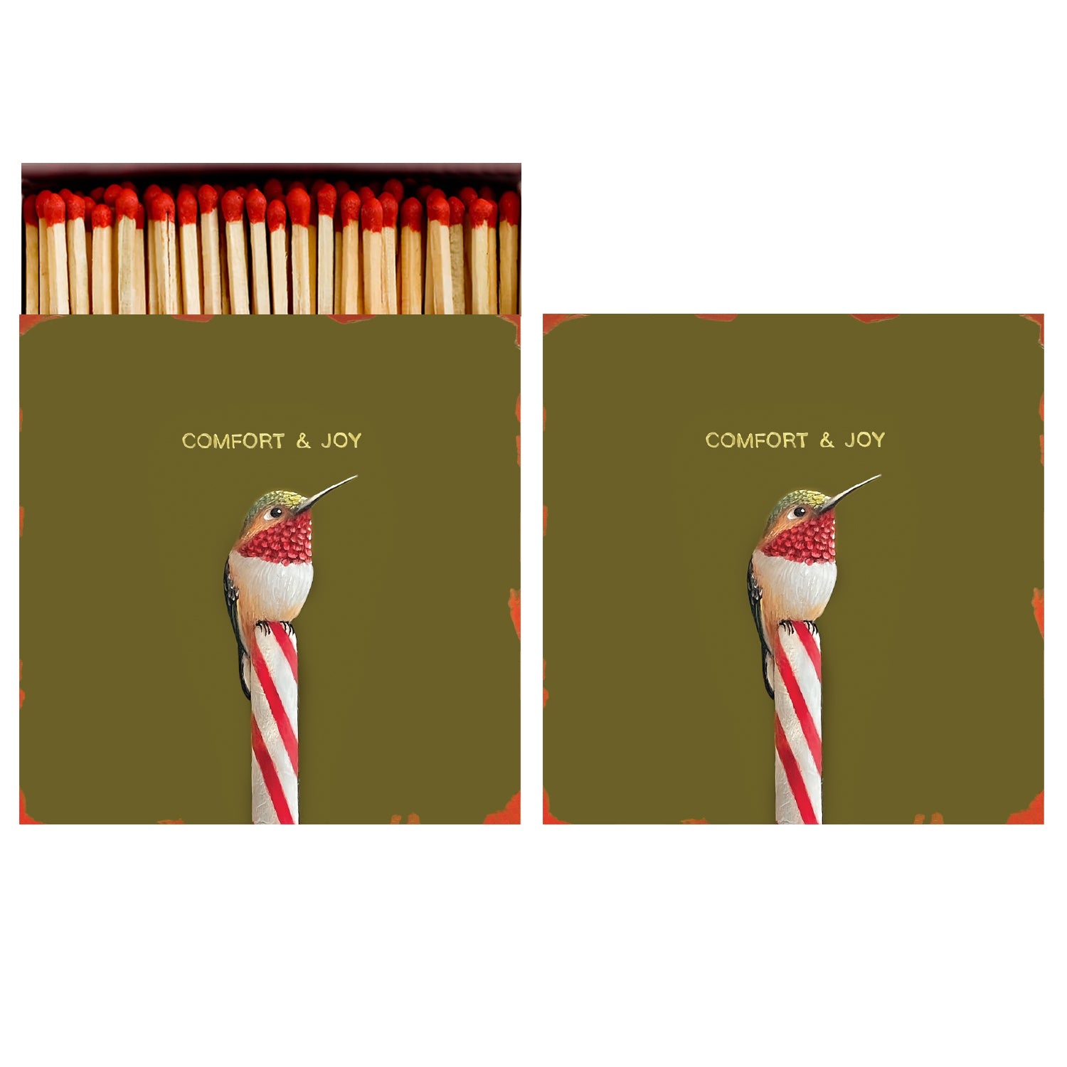 Two identical sides of a square match box, the left of which is open slightly to reveal the matches inside. The artwork on the box depicts a white, red and green hummingbird perched on a candy cane on an olive green background, with &quot;COMFORT &amp; JOY&quot; printed in gold.