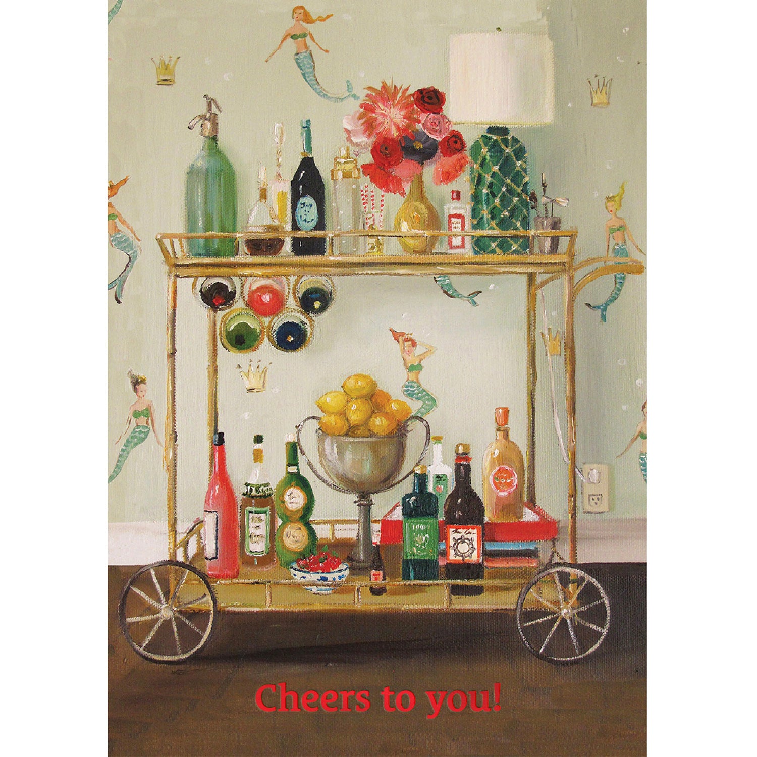 A painterly illustration of a mobile bar cart with an assortment of beverages, standing out against a mermaid-themed wallpaper, with &quot;Cheers to you!&quot; printed in bright orange along the bottom of the card.