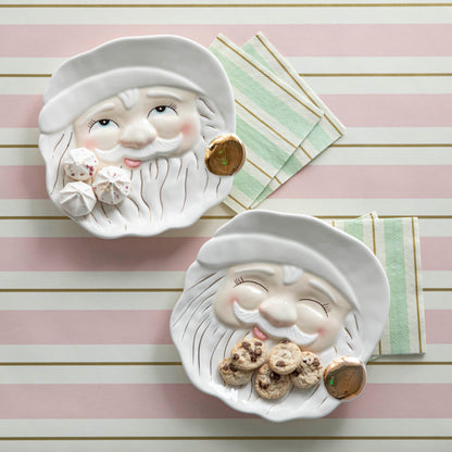 Two ceramic plates with Santa Claus faces on them, named Cream Papa Noel Cookie Plates by Glitterville.