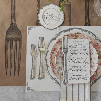 Cutlery on Kraft Runner under the Perfect Setting Story, with a place setting for one.