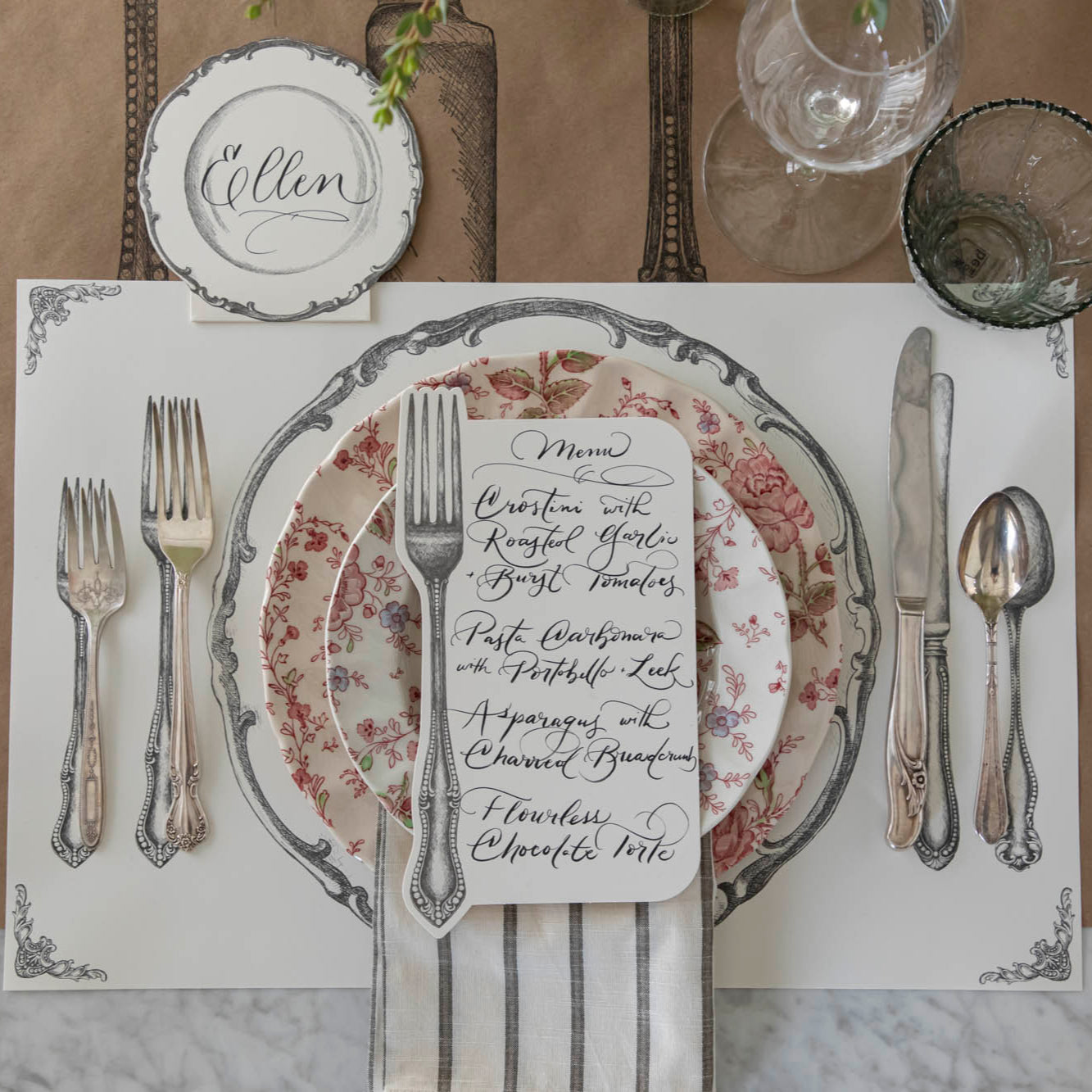 Perfect Setting Placemat styled with vintage silverware and china on top and the Cutlery on Kraft  Runner underneath.