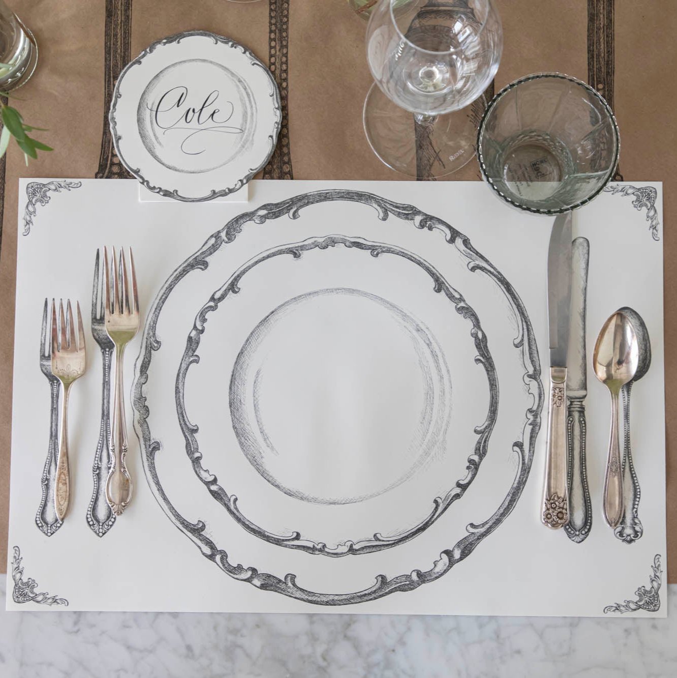 Perfect Setting Placemat with vintage silverware on top and the Cutlery on Kraft  Runner underneath.