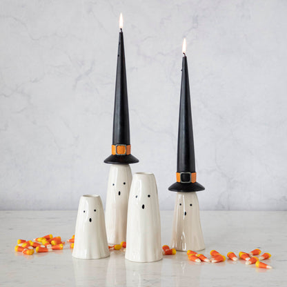 Three Phantom Candleholders from Accent Decor with candy canes on them.