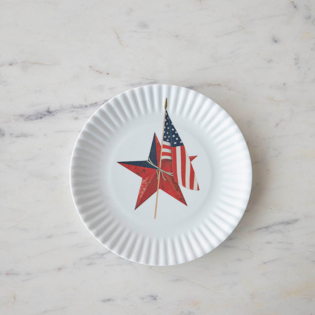 Disposable Melamine American Holiday Plates with Fourth of July-themed decorations on a white background from Glitterville.