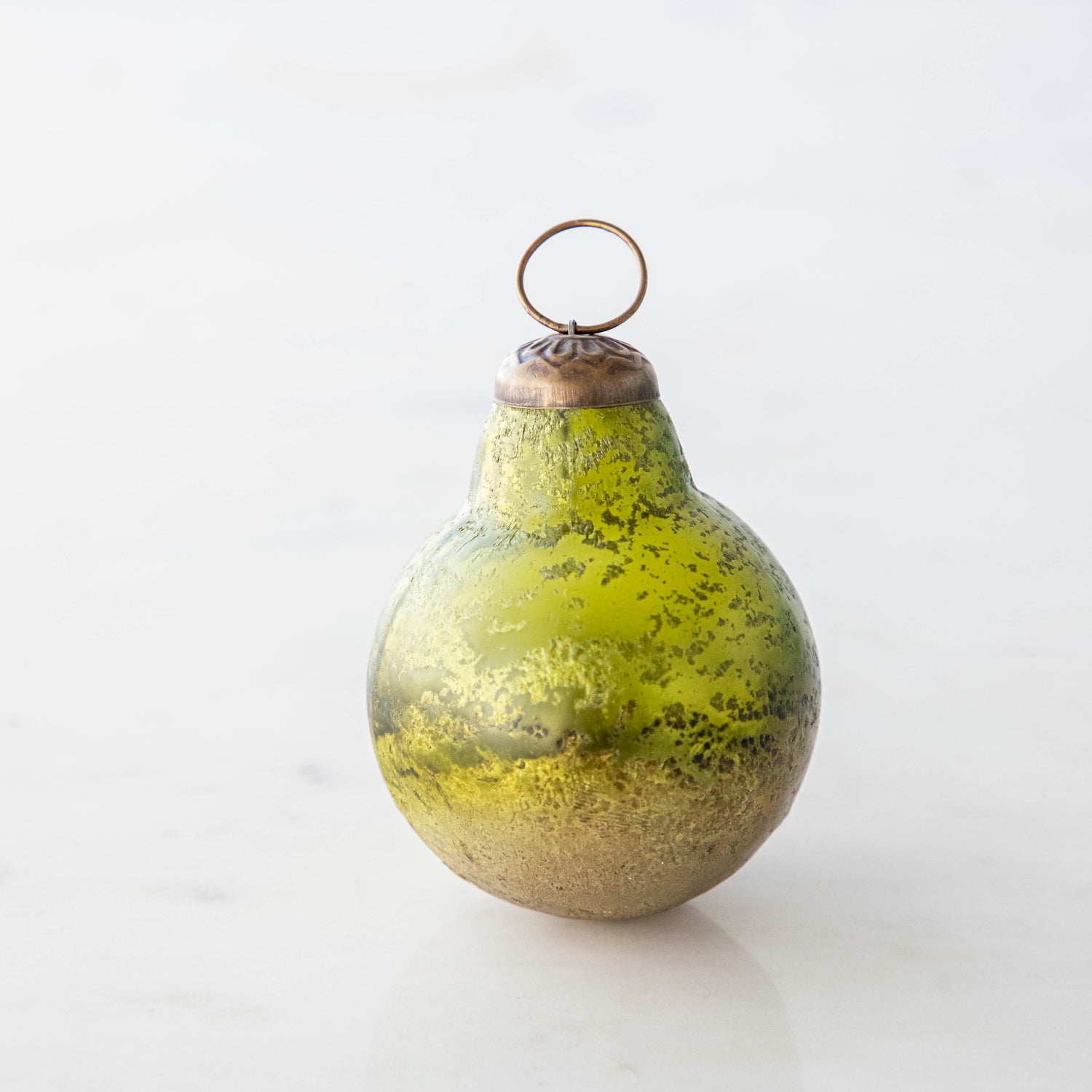 Green Kugel Ornament on a white background