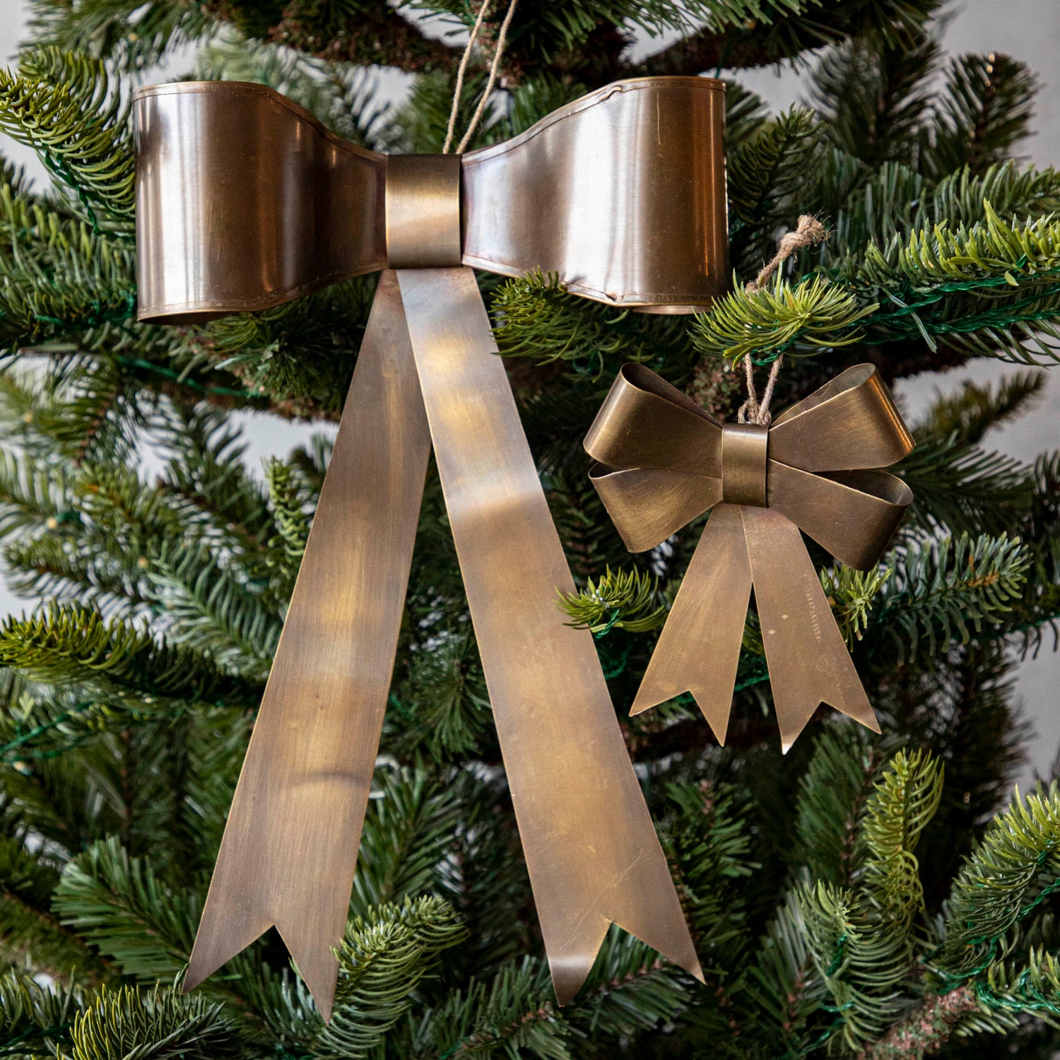 Double and single brass bow in Christmas Tree