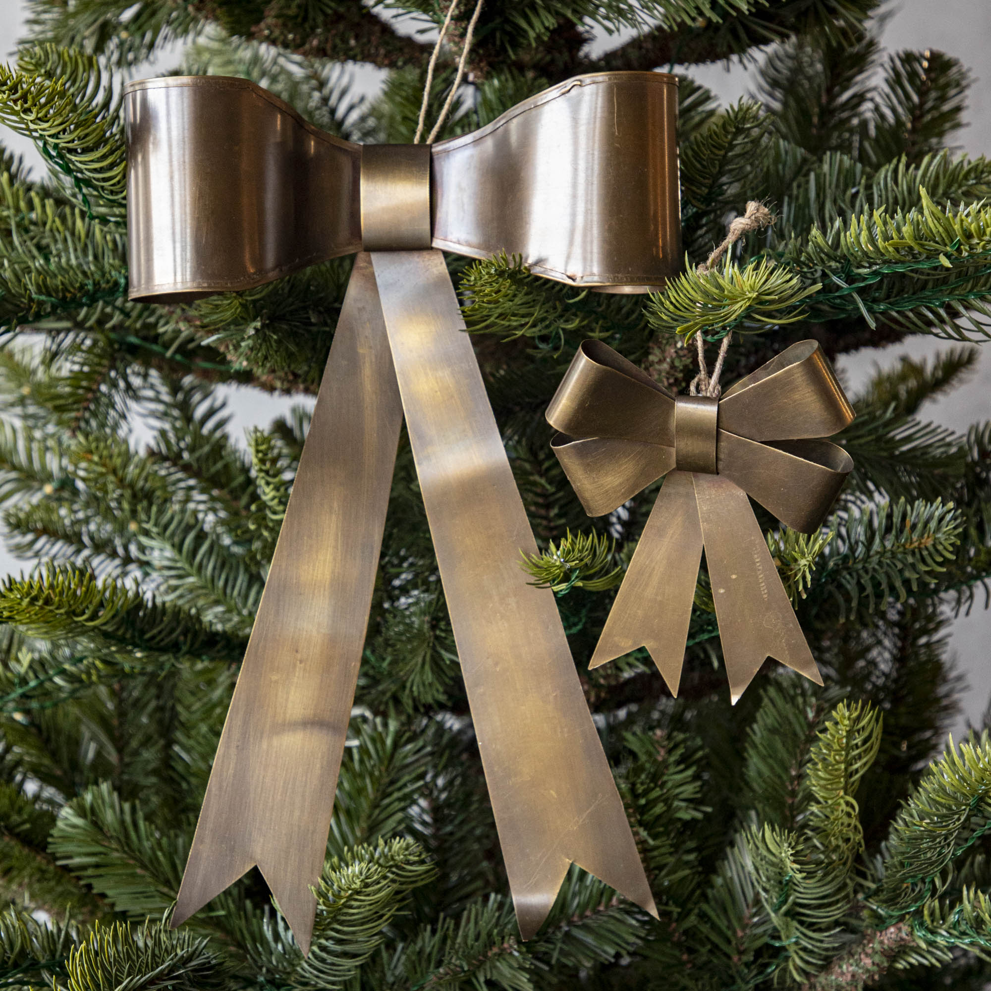 Double and single brass bow in Christmas Tree