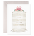 front of card with illustration of a wedding cake that says in gold foil "happy happy happy happy wedding"