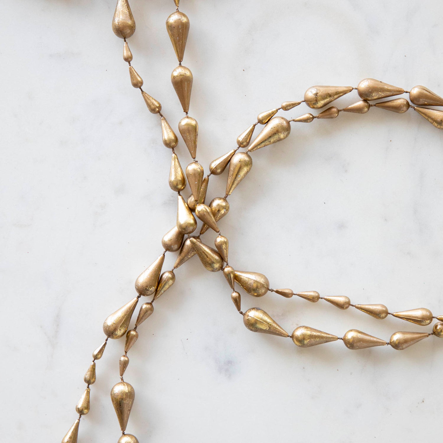 close up of drop gold garland