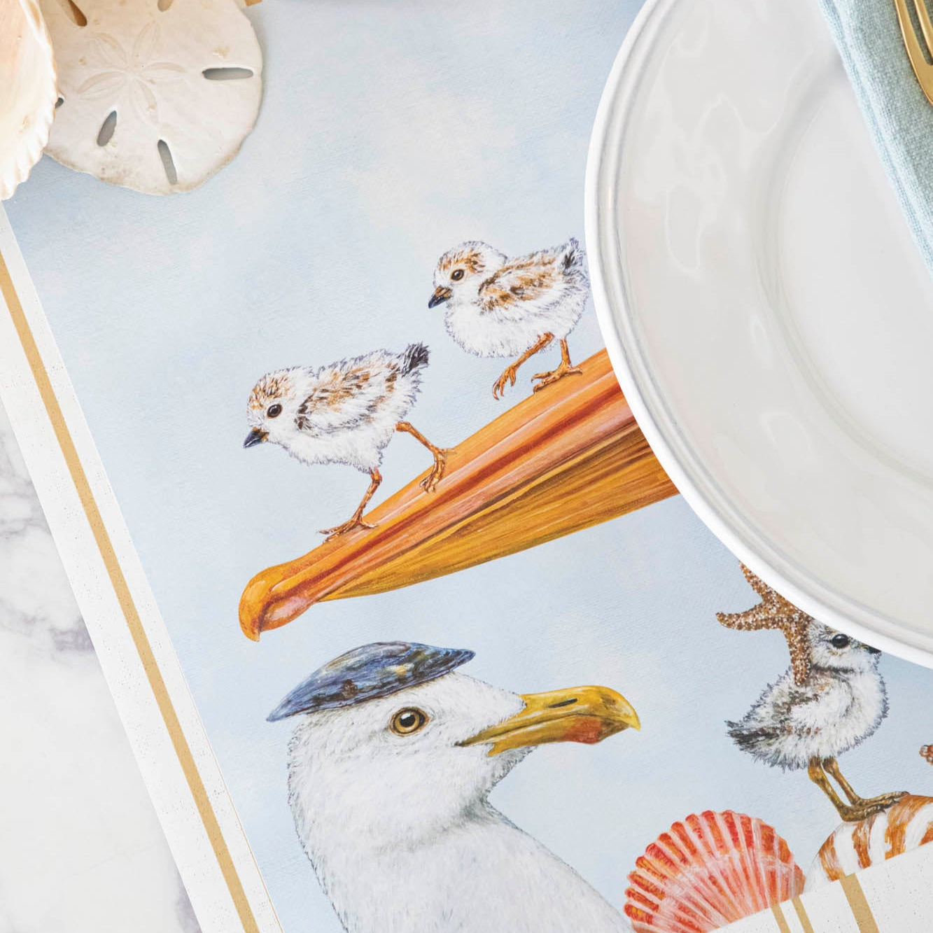 A close up of the Shorebirds Placemat showing birds walking on a beak.